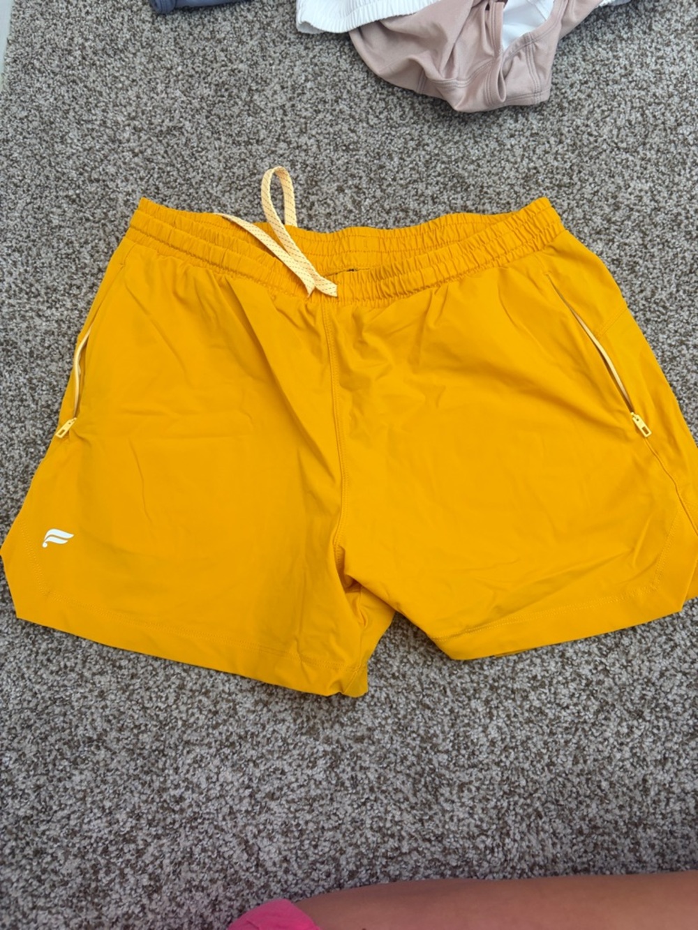 Fabletics Women's Athletic Shorts in Mustard Yellow